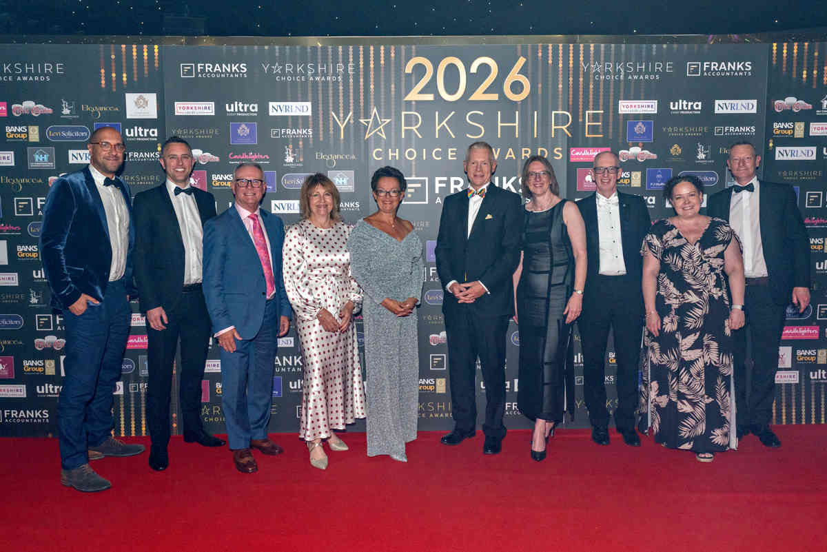 The team at the awards ceremony in June 2026