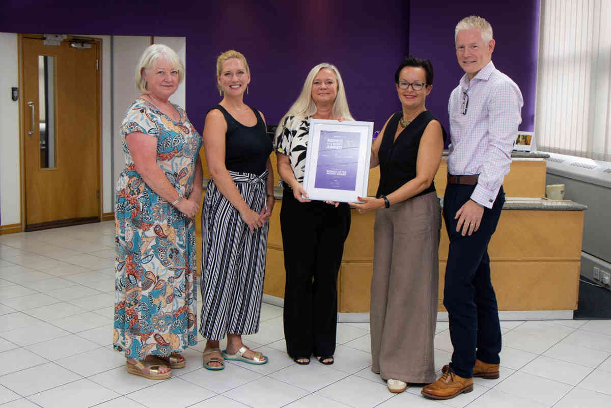 Receiving the award in July 2025